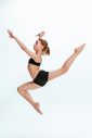 The girl jumping as modern ballet dancer