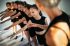 Teacher and group of children exercising dancing and ballet in dance school